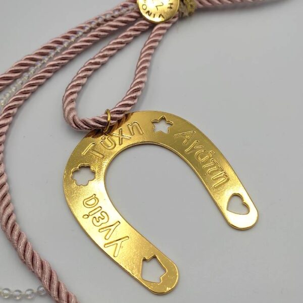 charm horseshoe with wishes